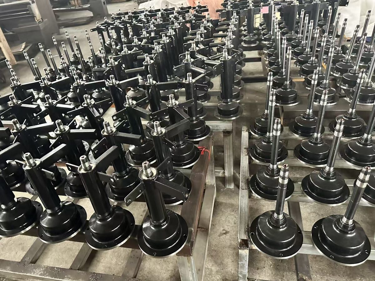 Automotive service equipment components organized for assembly